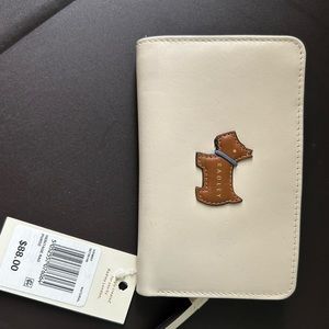 Radley London wallet. NWT. Super cute. Lightweight, 6”wide, 3.5” tall.